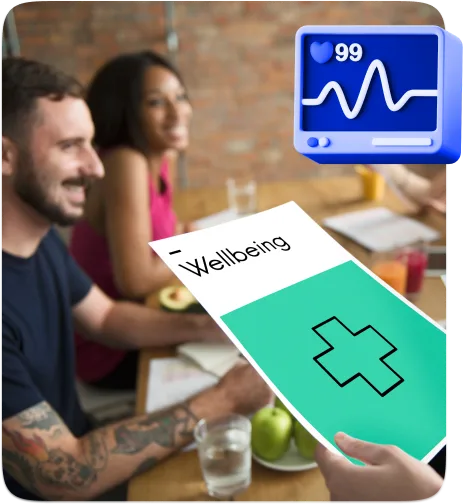 Drei Personen am Tisch mit einer Broschüre über Wellbeing und einem Bildschirm mit Herzfrequenzanzeige.